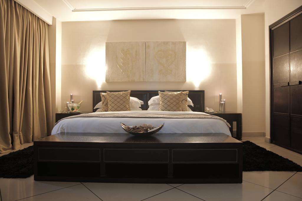 Oak Plaza Hotels East Airport Acra Quarto foto